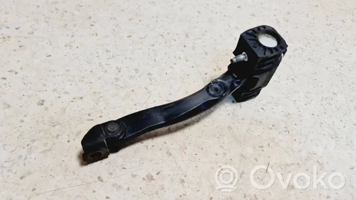 Opel Astra H Front door check strap stopper 13107175