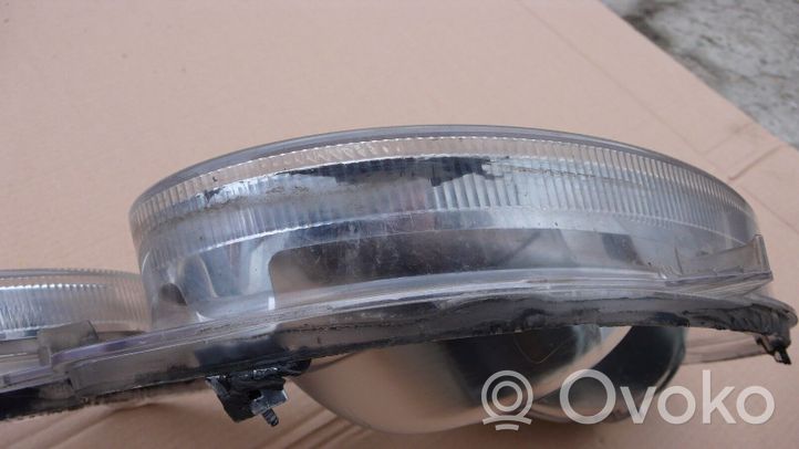 Mercedes-Benz E W211 Lente del faro 15435300