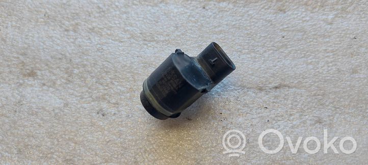 Nissan Qashqai Uchwyt tylnego czujnika parkowania PDC 28438BG00A