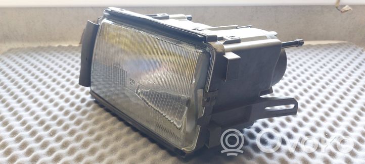 Mercedes-Benz 280 560 W126 Lampa przednia 1305235061