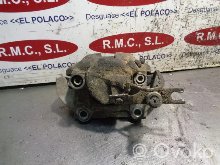 Volkswagen PASSAT Front brake caliper 