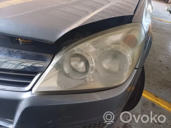 Opel Astra H Lampa przednia 1EG27037041