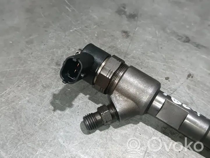 Opel Corsa E Inyector de combustible 0445110351