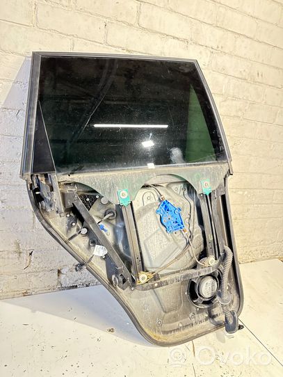 Volkswagen Touareg I Rear door window regulator with motor 7L6845206B