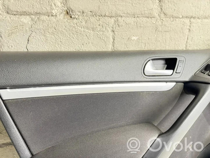 Volkswagen Tiguan Rivestimento del pannello della portiera anteriore 5N0867011