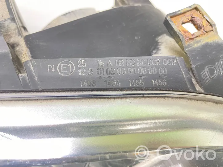 Volkswagen Touran I Lampa przednia 1T0941006E