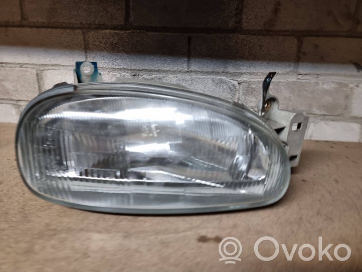 Mazda 121 Lampa przednia 0014095