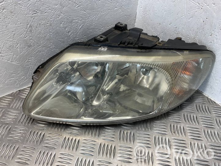 Chrysler Grand Voyager IV Headlight/headlamp 04857711AB