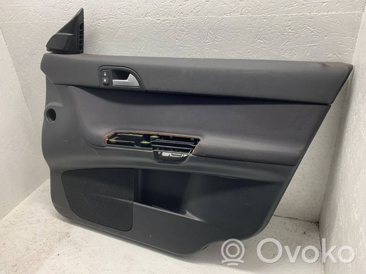 Volvo V50 Garniture de panneau carte de porte avant 39996055