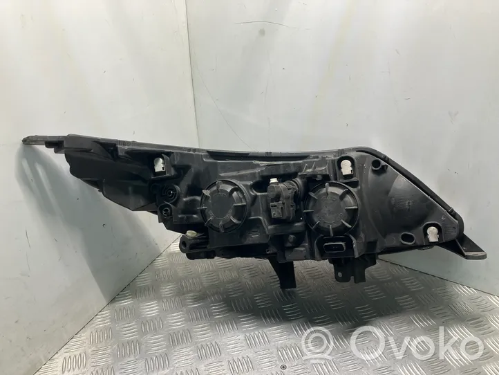 Renault Latitude (L70) Lampa przednia 260604348R