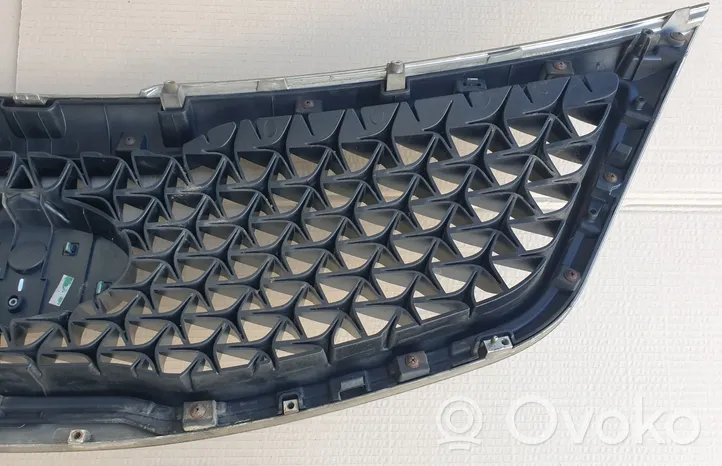 KIA Sportage Maskownica / Grill / Atrapa górna chłodnicy 863523U500