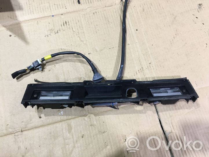 Hyundai Tucson TL Trunk door license plate light bar 87372D7010