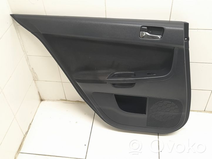 Mitsubishi Lancer X Rivestimento del pannello della portiera posteriore 7222A257XA