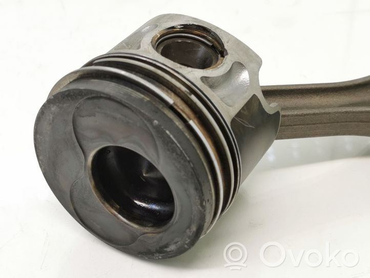 Volkswagen Jetta V Piston with connecting rod 34110605