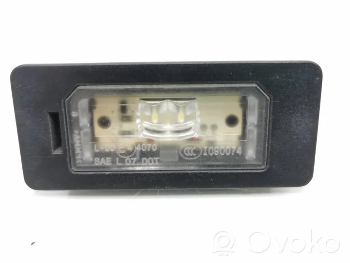 BMW X5 E70 Lampa oświetlenia tylnej tablicy rejestracyjnej 7193293