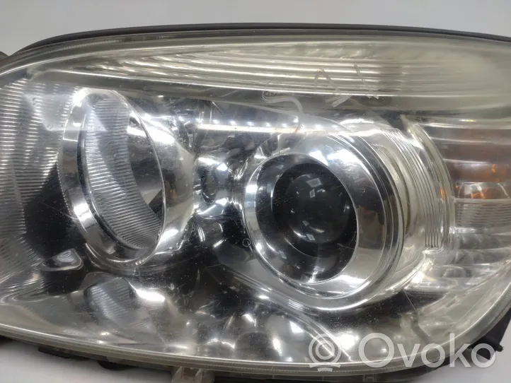 Toyota RAV 4 (XA30) Lampa przednia 1090034