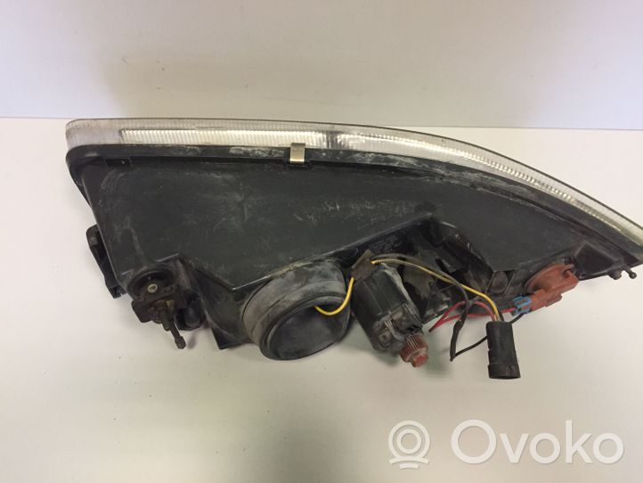 Chrysler Stratus Lampa przednia 93831201