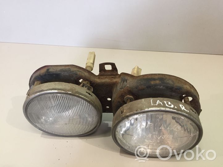 BMW 3 E30 Lampa przednia 305126082