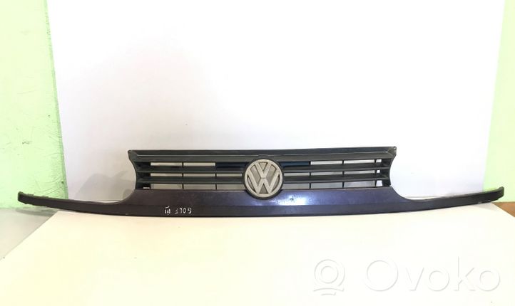 Volkswagen Golf III Griglia superiore del radiatore paraurti anteriore 1H6853653