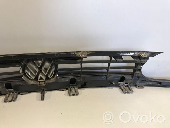 Volkswagen Golf III Front bumper upper radiator grill 1H6853653