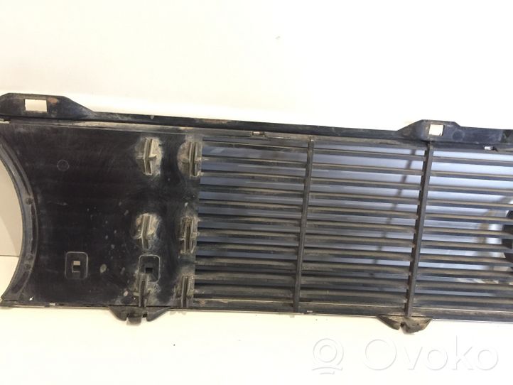 Volkswagen Golf I Grille de calandre avant 321853601