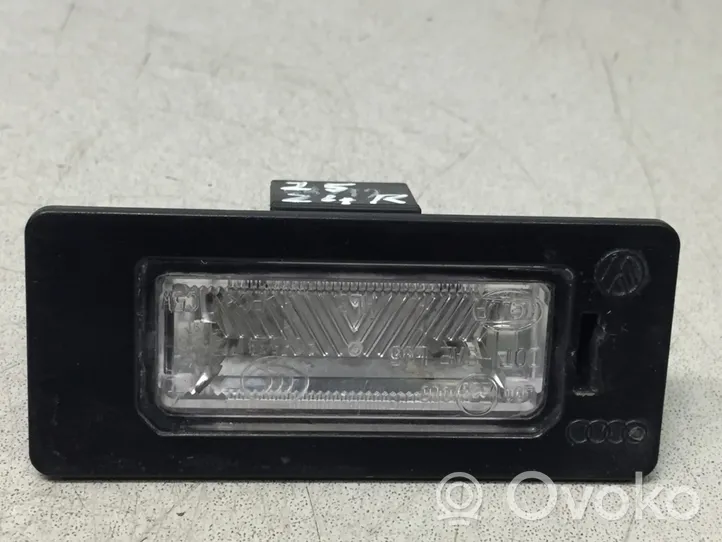 Skoda Yeti (5L) Lampa oświetlenia tylnej tablicy rejestracyjnej 8T0943021