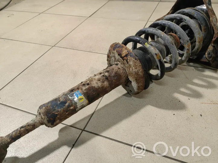 Volkswagen PASSAT B5 Front shock absorber with coil spring 