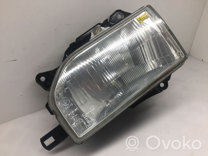 Mazda 121 Headlight/headlamp 11061238