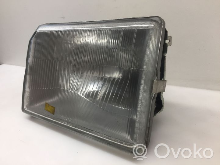 Mazda 323 Lampa przednia 10041790L