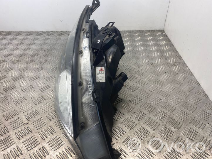 Ford Focus Lampa przednia XS4X13005