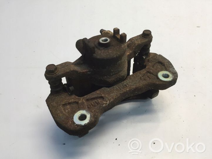 Mitsubishi L200 Caliper de freno delantero 