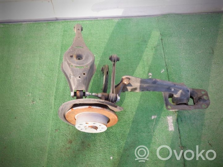 Volkswagen Jetta VI Rear wheel hub spindle/knuckle 5C0501051AQ