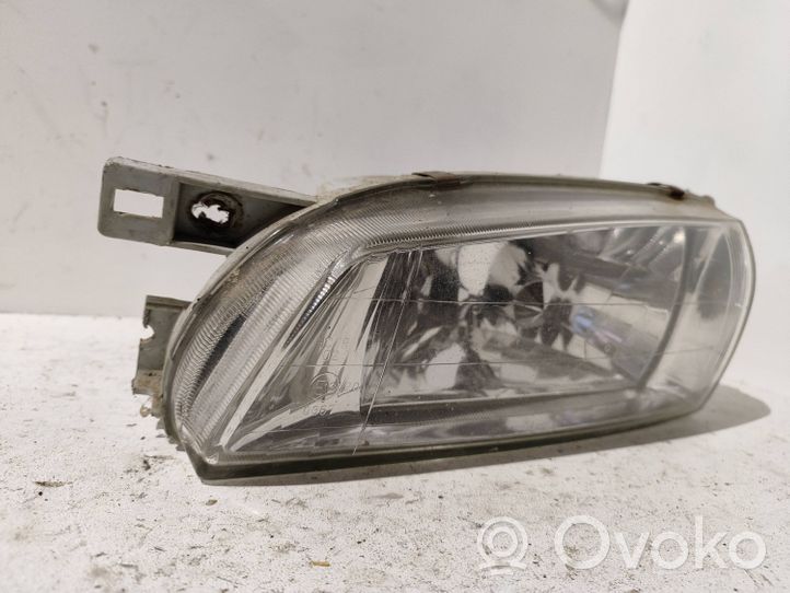 Subaru Impreza I Lampa przednia 083201114L