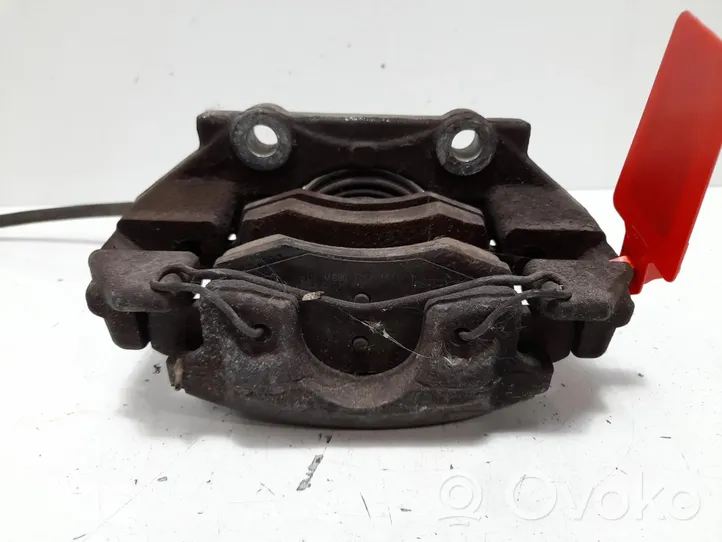 Dacia Logan I Front brake caliper 