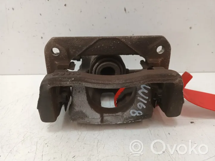 Opel Vectra B Caliper del freno trasero 7099