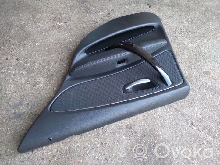 BMW 1 E81 E87 Rivestimento del pannello della portiera posteriore 6975310