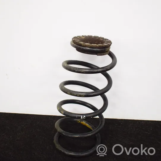 Opel Corsa D Muelle espiral trasero 