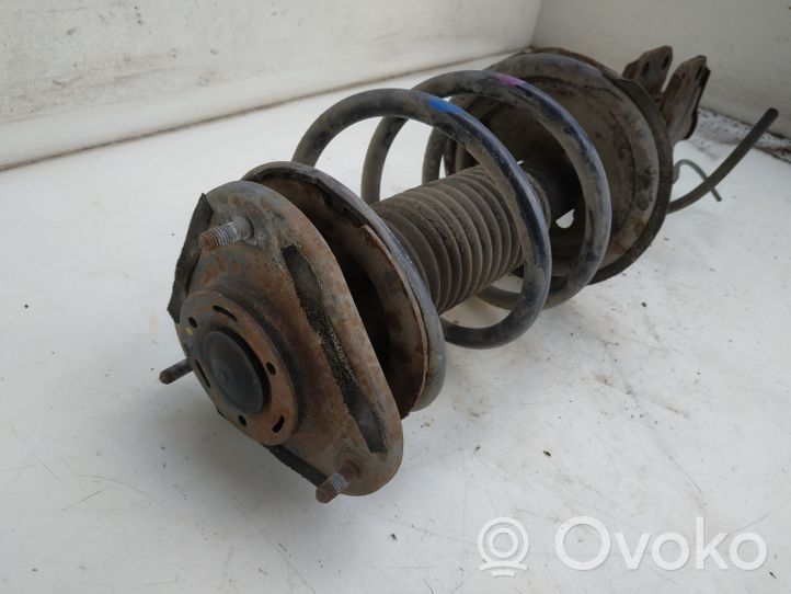 Toyota Avensis T250 Front shock absorber with coil spring 