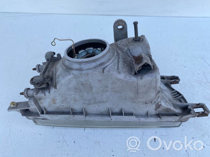 Toyota Corolla E90 Lampa przednia 12307