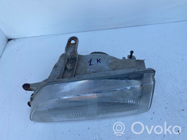 Toyota Corolla E90 Lampa przednia 082121140