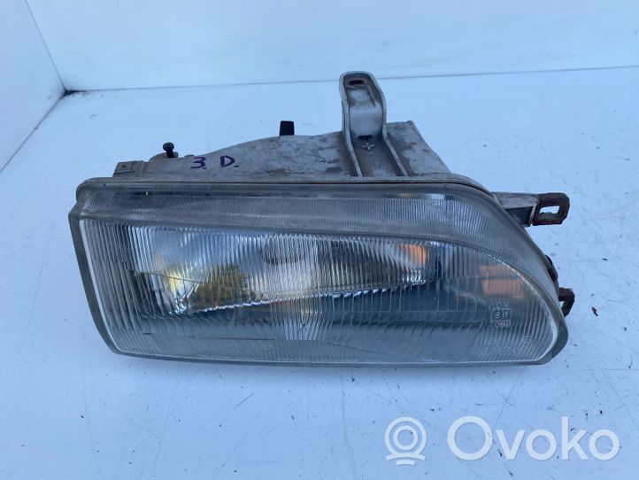 Toyota Corolla E90 Lampa przednia 12307