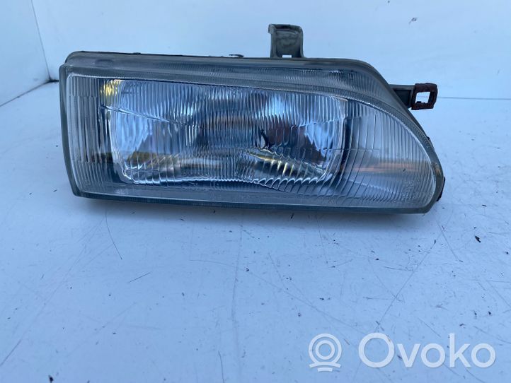 Toyota Corolla E90 Lampa przednia 201652B