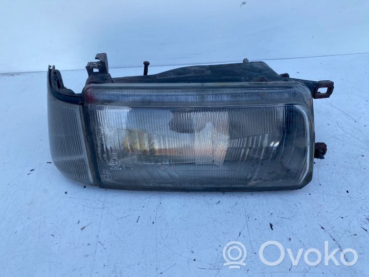 Toyota Corolla E80 Lampa przednia 12217