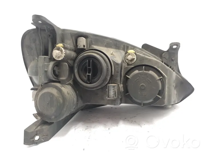 Opel Corsa C Lampa przednia 09114329