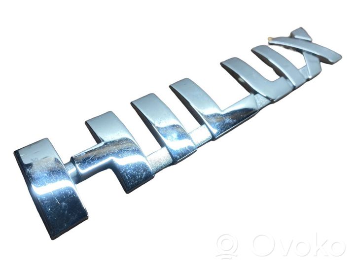 Toyota Hilux (AN120, AN130) Logo portiera di carico posteriore 754270K030