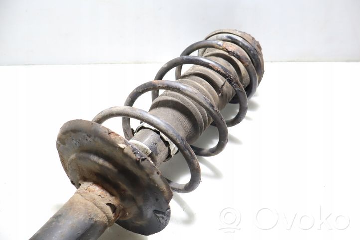 Toyota Aygo AB10 Front shock absorber with coil spring 