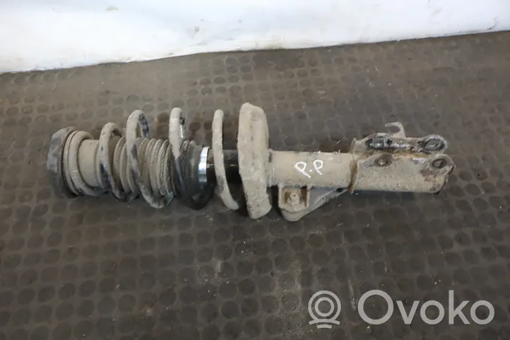 Opel Astra J Front shock absorber with coil spring 