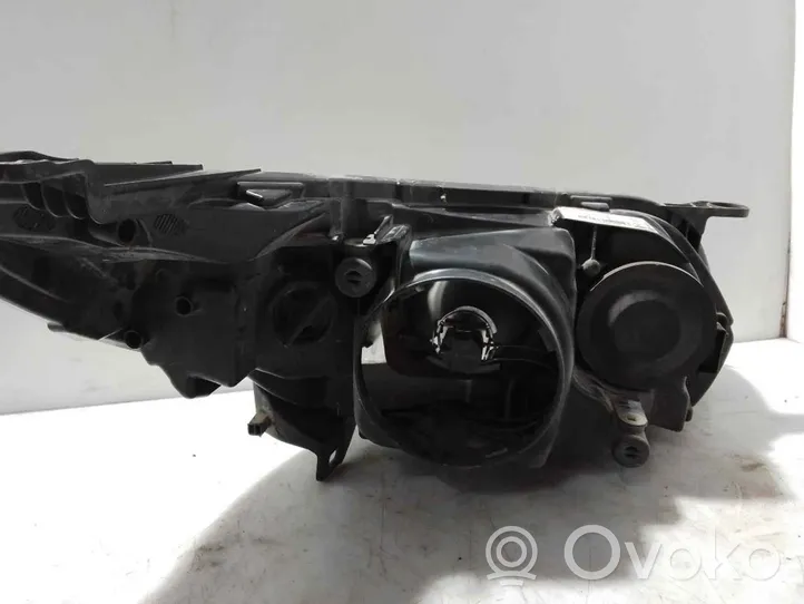 Saab 9-3 Ver2 Lampa przednia 1LL009606