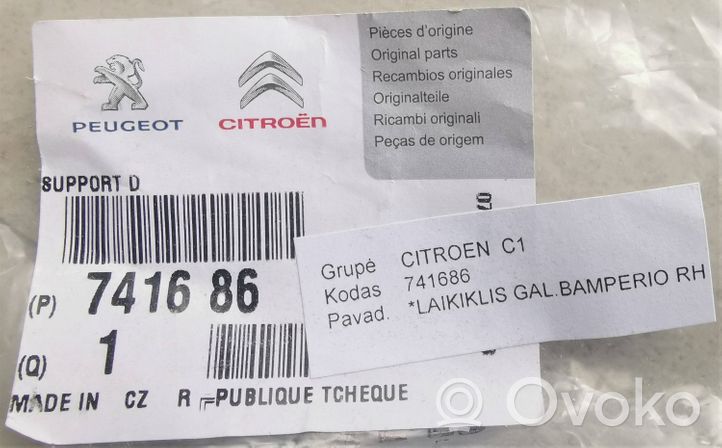 Peugeot 107 Uchwyt / Mocowanie zderzaka tylnego 741686