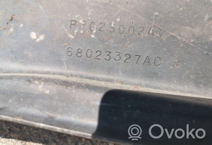 Dodge Grand Caravan Jäähdyttimen kehyksen suojapaneelin kiinnike 68023327AC